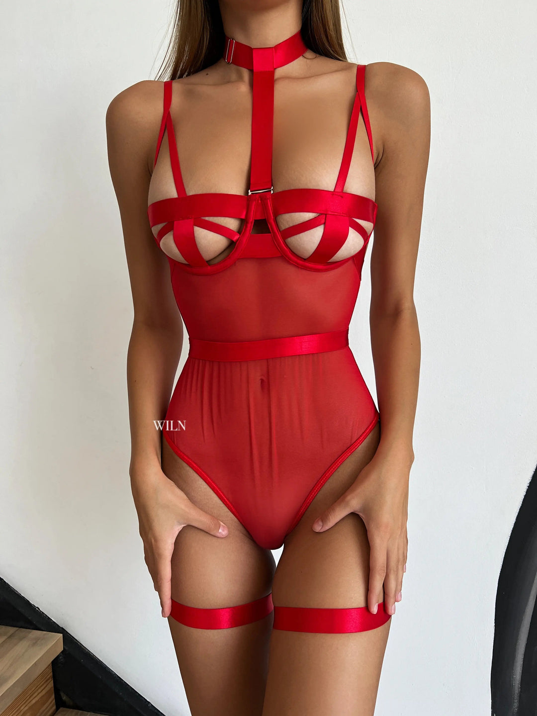 Unleash Your Inner Siren with WILN.com's DOMINATRIX Bodysuit Unleash Your Inner Siren with WILN.com's DOMINATRIX Bodysuit